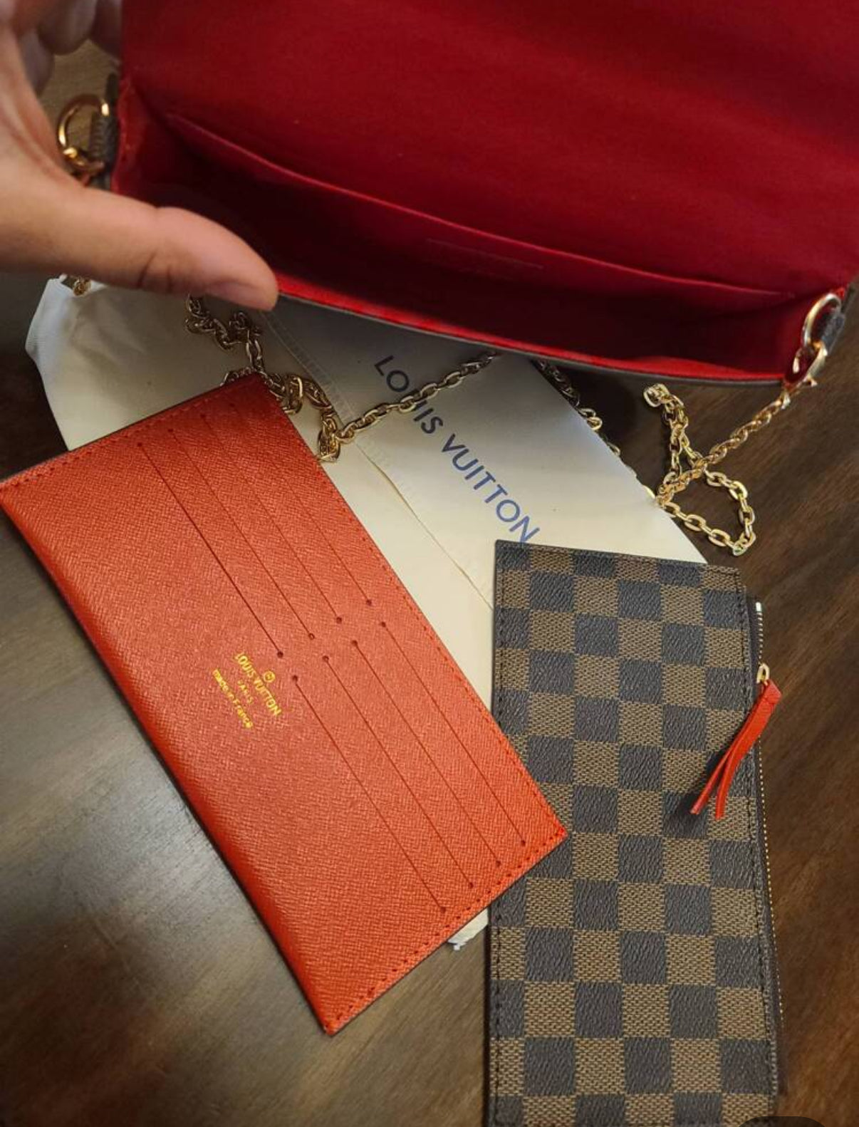 Small leather LV pouchette bag with chain and