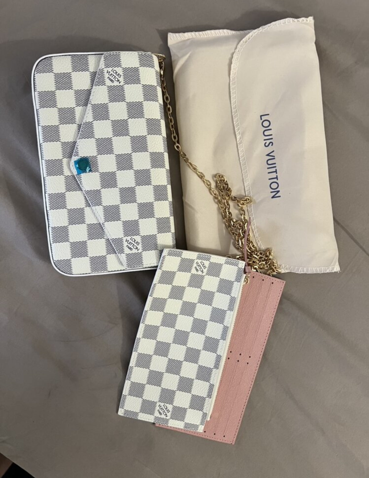 Small leather LV pouchette bag with chain and