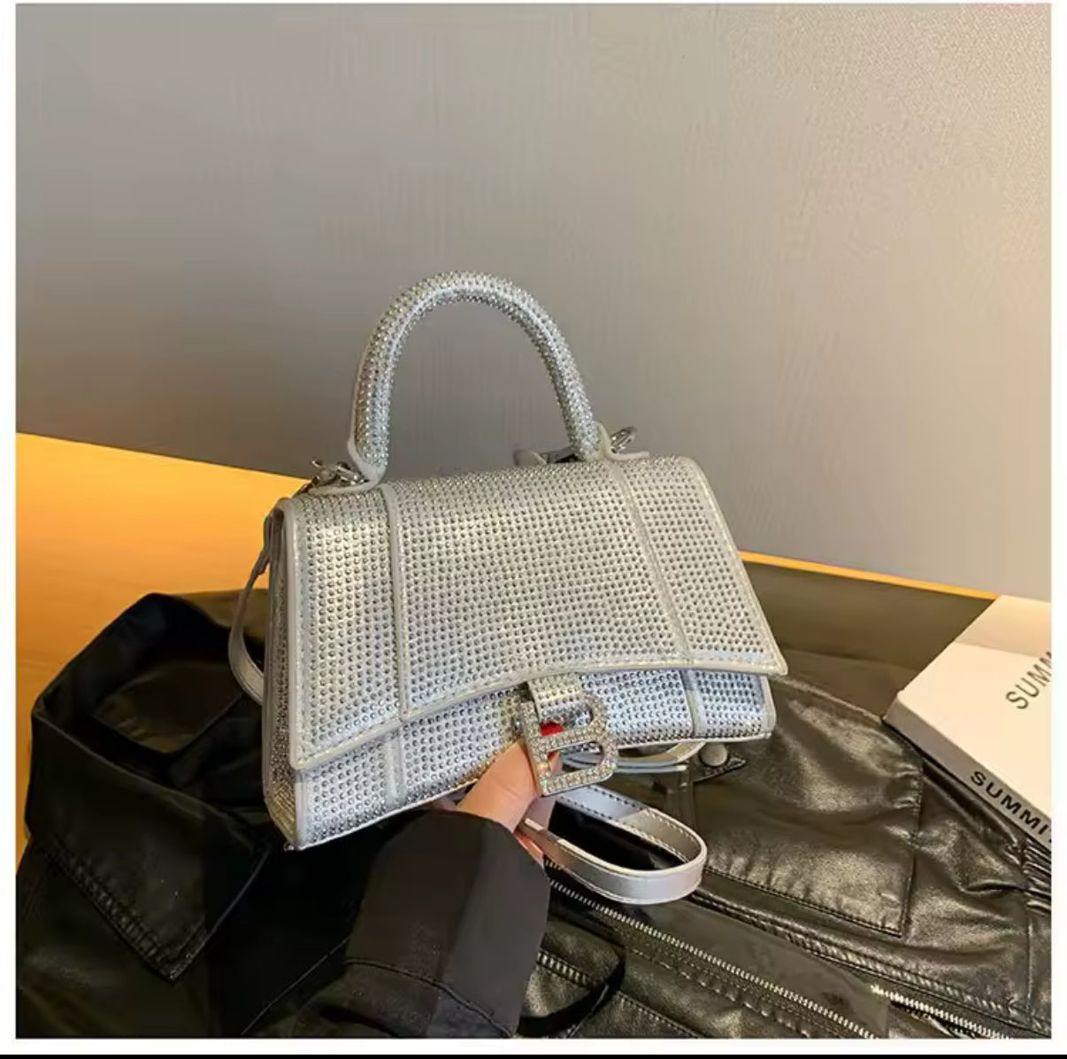 Swarovski crystal evening bag with B logo