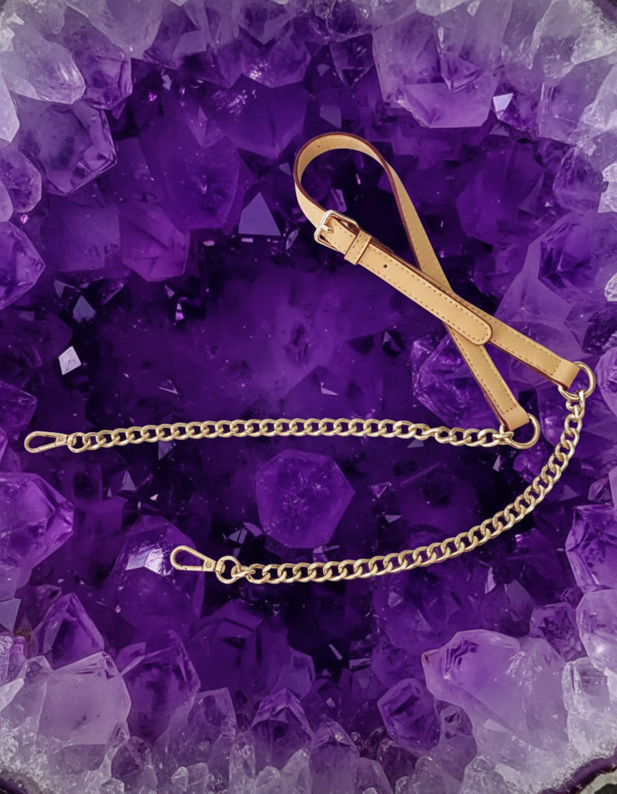 Gold chain belt on a purple crystal background